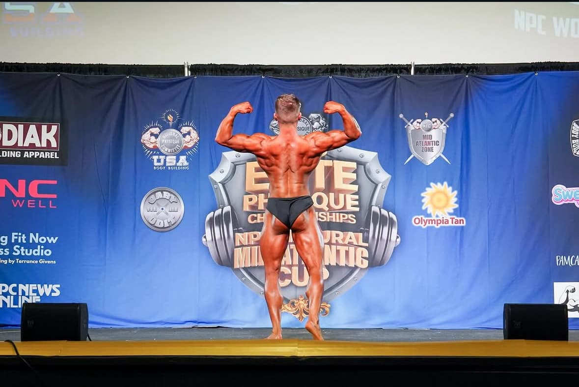 Joseph competing on the natural bodybuilding stage